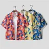 Designer Suit Hawaiian Sanya Holiday Beach Flower Shirt Mens Short Sleeve Fashion Versatile Couple Fragmented Set Wamc