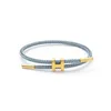 Bracciale regolabile di lusso multicolore con ciondolo regolabile Moda senza sbiadimento Filo di acciaio inossidabile Bracciale con corda impermeabile per uomo Donna GioielliL2403