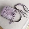 Storefront 2024 nova bolsa feminina dempsey balde portátil roxo jacquard mini cordão um ombro crossbody