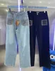 Jeans para mujer Diseñador MM Familia 24ss Nueva letra Bordado Decoración Moda Versátil Slim y Leggy Pantalones largos y rectos 8FCY