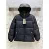 Femme Designer Down Jacket Automne et hiver Hommes Femmes Puffer Vestes Manteau Impression Revers À Capuchon Zipper Casual Parka