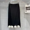 Kjolar 2024 Vår- och sommarpaket kjol för kvinnor tredimensionell blomstitching enstegs midi faldas
