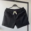 Pantalones cortos para correr de verano para hombre, pantalones cortos informales negros para gimnasio y Fitness, pantalones cortos informales cómodos con cordón en la cintura, pantalones cortos sólidos con múltiples bolsillos 240314