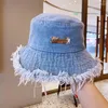 Berets Summer Usisex Tassel مغسول القبعات دلو دلو الموضة للنساء على نطاق واسع قابلة للطي قبعة بنما في الهواء الطلق شاطئ الصياد القبعة