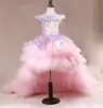 Vestidos de desfile para niñas de lentejuelas rosadas con hombros descubiertos Vestido de fiesta de tul con cordones en niveles Falda con volantes en la espalda Niña de flores hinchada Dre2343959