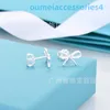 2024 Jewelry Designer Brand Stud Smooth Bow Female Copper Plated 18k Genuine Gold Plum Blossom Plug Print Personalized Earrings