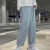 Męskie dżinsy mężczyźni retro streetwear szeroka noga z guzikami zamykającymi kieszenie na zamykanie luźnych pantów dżinsowych do