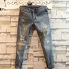 メンズジーンズのズボンが穴で引き裂かれたマンカウボーイパンツタイトなパイプリッピングクロップドスキニースリムフィット服Y2K 2000Sビンテージ