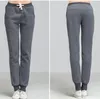 Pantalones de mujer Pantalones de chándal elásticos cálidos de lana de otoño e invierno sueltos de terciopelo grueso para mujer talla grande 6xl pantalones deportivos para correr para mujer