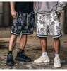 Designer Men Shorts New Summer Fashion Hip Hop Loose Casual Basketball Printed Flower Five Quarter Pants