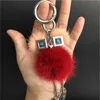 Designer äkta Real Fur Chick Monster Robot Doll Toy Charm Fur Pompom Ball BAG Charm Key Chain Keyring Bag biltelefon Tillbehör 6Q5F