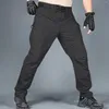 メンズパンツ男性メンズスタイルのカジュアルなズボンルーズラージレジャー3バッグストリングツールマルチポケットストレートパンタロンhomme