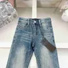 Brand Baby Washed Dżinsy jeansowe Designer dżinsowe spodnie rozmiar 110-150 metalowa dekoracja ozdobna dziecięce spodnie 24MAR