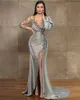 2024 Silver Sheath Long Sleeves Evening Dresses Wear Illusion Crystal Beading High Side Split Floor Length Party Dress Prom Gowns Open Back Robes De Soiree