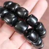 Strand Supply Bracelet Bouddha en perles de corne noire