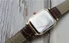 腕時計の豪華な女性は、シンプルなローマ数字を見る小さなダイヤルクォーツ時計レディース長方形ニッチクロック女性ビンテージリロジ腕時計