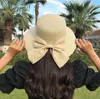 Ampla borda chapéus dobrável grande floppy meninas chapéu de palha sol com bowknot elegante proteção sombreamento moda praia bonés para mulher 2024