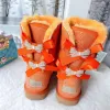 2024 Novo designer feminino pele de uma peça botas de diamante mulheres inverno botas de neve moda austrália clássico curto arco bota tornozelo joelho arco menina mini sapatos bailey