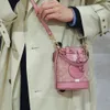 Sac à bandoulière Dempsey pour femmes, vente en gros d'usine, seau avec cordon de serrage, bourgeon parfumé à l'eau, nouvelle collection printemps 2024