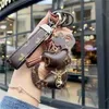 Designer Luxus Designer L Schlüsselbund Männer Frauen Mode Katze und Hirsch Blume Tasche Anhänger Zubehör Niedliche Karabiner Schlüsselanhänger Liebhaber Autoschlüssel Ketten Schlüssel T2DK