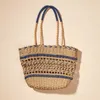 New hollow woven fashionable women's bag contrast color paper rope straw woven bag travel holiday photo bag 240315