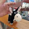 Preço por atacado adorável justo pequeno burro pingente de pele de pelúcia animal chaveiro brinquedo pendurado ornamentos meninas saco pingente de pelúcia chaveiros 2024