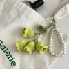 Porte-clés Creative Laine Crochet Bolling Orchidée Porte-clés Ins Mignon Fille Perle Chaîne À La Main Sac Tricoté Pendentif Bijoux De Mode