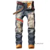 Dżinsowe dżinsy Designer Hole Wysoka jakość rozerwana dla mężczyzn Rozmiar 28-38 40 jesienna zima plus aksamitne hip-hopowe punkowe spodnie streetwearu 983