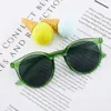 Version coréenne de la tendance des couleurs de gelée pour enfants à la mode et minimaliste, lunettes de soleil personnalisées, lunettes de plage expédiées