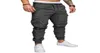 2018 Plus Size 4xl 3xl Grey Men Men Pants Sport Joggers Spodnie Czarne Fitness Gym Odzież z kieszeniem Sprzęty Staione 5784123