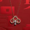 Designer 925 Sterling Silver Tiffany and Co Qianxi Même collier clé plaqué avec pendentif en or 18 carats Nouvel An Red Jade Marrow Iris