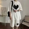 Mężczyzny Hip Hop Waffle z krótkim rękawem Zestaw Męki 2024 Summer graniczny High Street Love Shorts Unisex Sports Suits Q240314