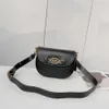 Fabrieksgroothandel c Familys nieuwe dameszadeltas hardware effen kleur enkele schouder crossbody eenvoudige mode casual