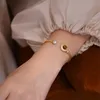 Bracciale rigido con pietra occhio di tigre di fascia alta, design di nicchia retrò, versatile e leggero, braccialetto aperto Maillard di lusso per donna.