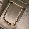 Designer hoge versie V goud tiffay en co U-vormige hoefijzer ketting dames bamboe gezamenlijke dubbele ring in elkaar grijpende paar kraag ketting mesh rood dezelfde stijl