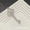 Designer-Kronenschlüssel-Halskette von Tiffay & Co voller Diamanten, schlichte, modische, kleine, luxuriöse, vielseitige Pulloverkette