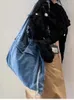 イブニングバッグ女性大容量デニムショルダーバッグガールズスタイル壊れたデザインキャンバスシンプルアーツ学生クラスハンドバッグ2024