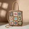 2023 New Fashion and Creative Multicolor Flower Splicing Woven Grass Bag Single Shoulder Handheld Checkered Forest Resort Bag 240315