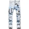 メンズデザイナージーンズパンツアムジーンズマンのスキニーメンズジーンズスターホンブルメンズパンツバイカー刺繍のトレンドコットンマンブラックジーンズのためにリッピング