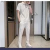 Tracki męskie Summer Ice Silk Casual Suit męska Młodzież Koreańska wersja Trend w paski koszulki z krótkim rękawami