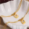 Collares colgantes Minar Personalidad Capas dobles CZ Zircon Moneda de corazón para mujeres Gargantillas de espiga chapadas en PVD de acero inoxidable