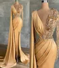 2021 Gorgeous Champagne Evening Dresses Crystal Beading Mermaid Long Sleeves Formal Illusion Party Prom Gowns Split Front Satin Ru5369424