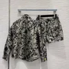 Kvinnors shorts tidigt på våren broderad fjäril casual lapel skjorta hög midja