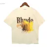Klasik Yaz Tasarımcı Gömlek Lüks Rhude T Shirt Kadınlar ve Erkekler Tshirt Kısa Kol ve Yuvarlak Boyun Moda Tees Bayanlar T-Shirts 718