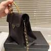 Designer-Tasche, lässige Tasche aus echtem Leder mit Metall-Handgelenkgriff, Handgepäcktasche, klassische, reine Tragetasche, Schultertasche oder Umhängetasche, einfach und schön