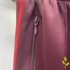 Pantaloni da uomo uomini e donne aghi farfalla il lato ricamato ricamato tasche rosso scuro tasche di alta qualità