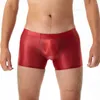 Underbyxor män glänsande glansiga boxare shorts smidiga bottnar sportstammar manliga leggings trosor man konvex påse underkläder för pojkar