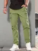 Pantaloni da uomo Tasche laterali Pantaloni cargo harem Cerniera nera Pantaloni da jogging maschili hip-hop casual Moda streetwear 240315