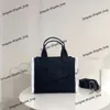 Women's luxury handbag designer bag fashion New Casual Letter Canvas Bag Colored Handheld Shoulder bag versatile large capacity shopping Tote bag