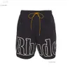 Rhude Basket Uomo Pantaloncini Sexy per Uomo Donna Moda Casual Riflettente Skateboard Hip Hop Spiaggia Rhude Tasca con Cerniera Pantaloncini Stampa Palestra 695